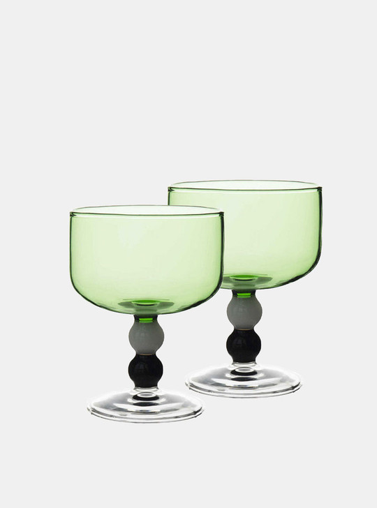 2 green glass goblets