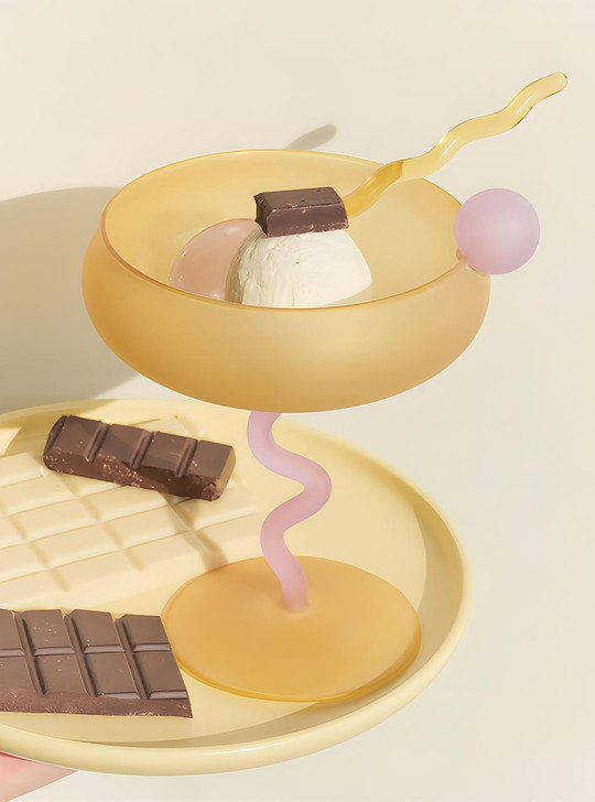 ice cream in coloured coupe dessert glass