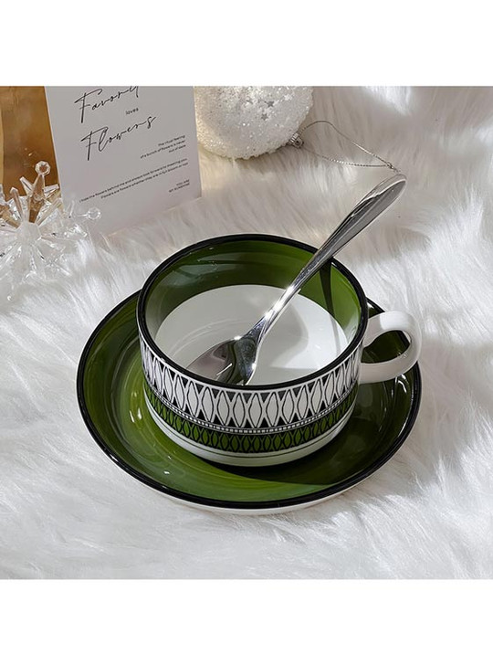 Green Striped Coffee Mug on White Leather Flannel