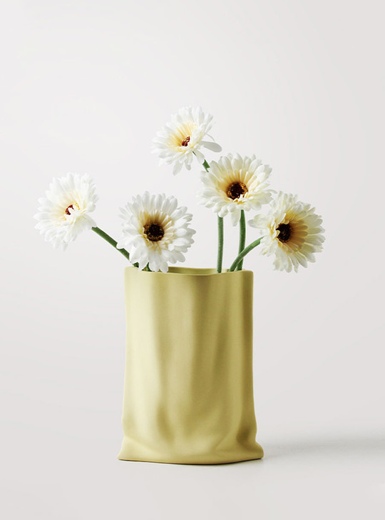 yellow paper bag vase