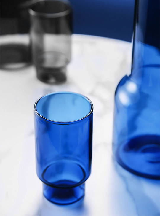 a blue glass cup
