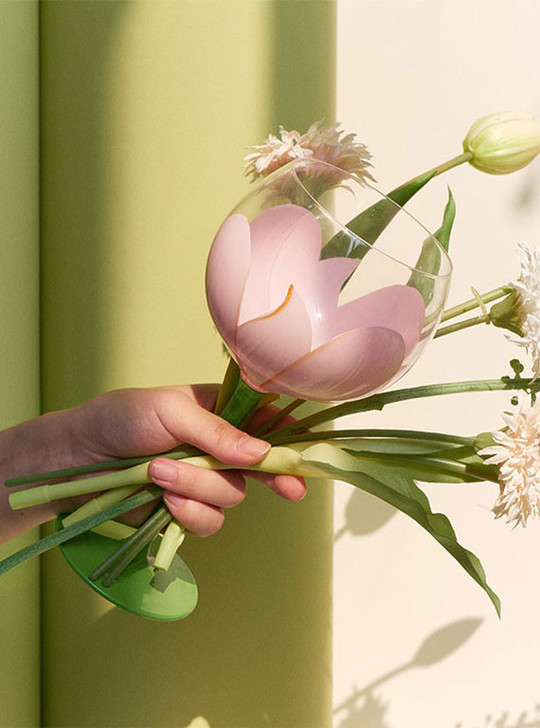 wine glass with painted tulip flower in hand