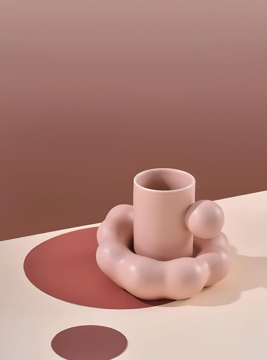 Unique chubby, rounded shape and ball-shaped handle.
