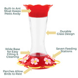 Wildflower Glass 20 oz. Hummingbird Feeder: Built-in ant moat keeps pests away, durable glass design, seven feeding stations, wide base for easy filling & cleaning, perches allow birds to rest.