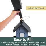 Blue Cottage Birdfeeder: Holds 5 lbs. of seed. Easy to fill - lift chimney and easily load birdseed with North States' Feeder Filler Scoop.