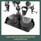 Large seed tray includes drainage holes to keep seed fresh