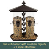 Two seed chambers with a combined capacity of 8 pounds of birdseed