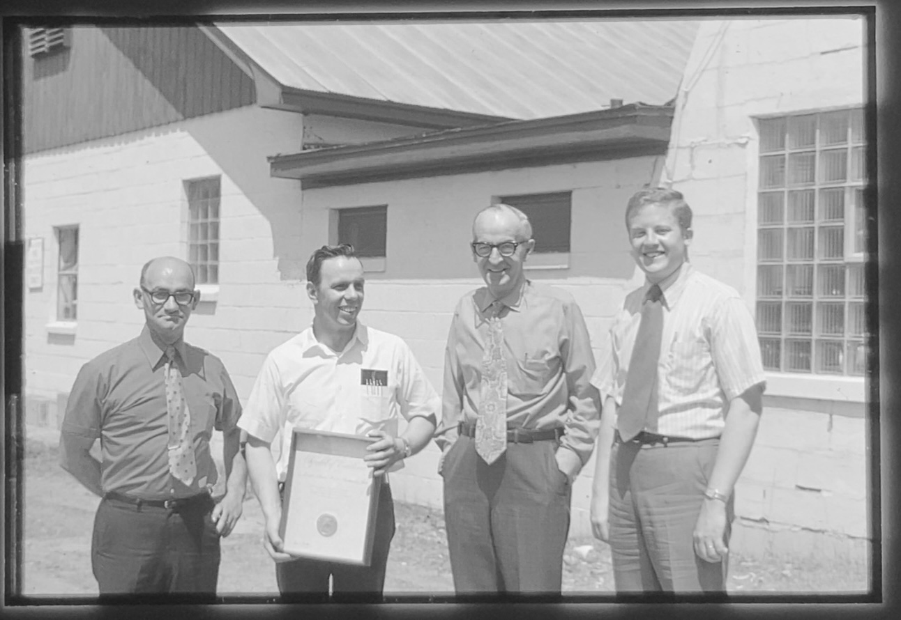 Founder Everett C. Pennock (second in from left) and other North States employees