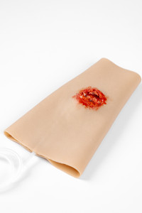 TraumaWear - a wearable & repeat use solution for rapid moulage. This one is simulating an Open Fracture wound and is simply pulled on to the forearm and add Stage Blood to your syringe or bottle for simulated bleeding. It is available in 11 different colours.