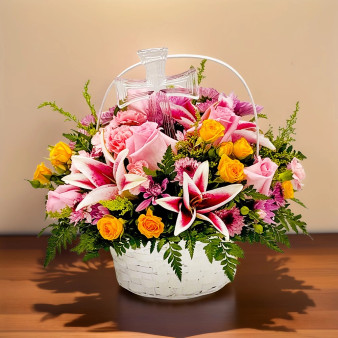Standard Eternal Faith Basket sympathy flower arrangement with roses, lilies and keepsake cross in white basket funeral flowers
