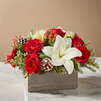 Snowy Wonderland Bouquet Deluxe on a table