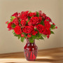 Key to My Heart Bouquet deluxe featuring red roses, carnations, and greenery arranged in a red glass vase