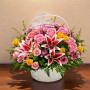 Premium Eternal Faith Basket sympathy flower arrangement with roses, lilies and keepsake cross in white basket funeral flowers