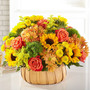 Harvest Sunflower Basket Premium featuring sunflowers, orange roses, and dianthus arranged in a rustic woven basket