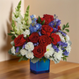 Premium red, white and blue arrangement in a cube container