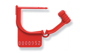 Photograph of red open spring hinge tamper seal.