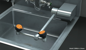 A photograph of a Guardian G1898 Eyewash, Wall Mounted AutoFlow™ 90º Swing-Down mounted on a wall behind a sink (sink not included).