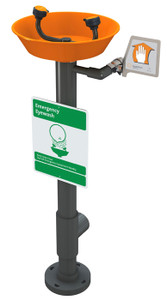 A photograph of an orange Guardian G1896 pedestal-mounted all-PVC eyewash.