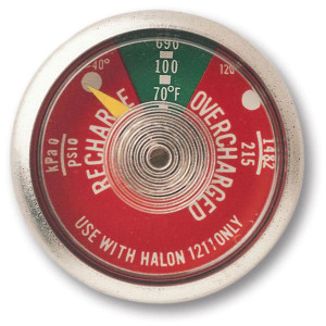 A photograph of front of a red 09832 halon 1211 fire extinguisher gauge.
