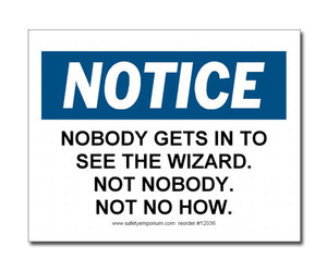 A photograph of a 12036 witty workplace label reading notice nobody gets in to see the wizard not nobody not no how.