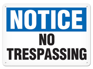 A photograph of a 01653 notice no trespassing OSHA sign.