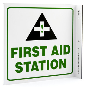 Photograph of the First Aid Station Wall-Projecting L-Sign w/ Icon.