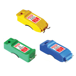 A photograph of three 07132 pin in and pin out breaker lockout devices.