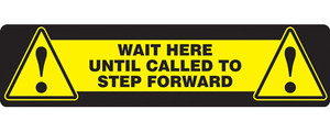 A photograph of a yellow and black 11202 social distance floor sign, reading wait here until called to step forward, with dimensions 6" x 24", and alert icons.