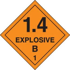 An orange and black photograph of a 03065 dot explosives shipping label, reading explosives 1.4B 1 with graphic.