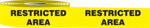 Photograph of roll of Tough-Mark™ Cold High Performance Marking Tapes in black and yellow, reading "Restricted Area".