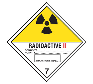 A photograph of a 03058 class 7 radioactive ii dot shipping labels, with 500 per roll.