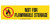 A yellow label with a black and red burning flame with a circle/slash prohibition icon on the left and black text of NOT FOR FLAMMABLE STORAGE on the right.