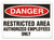 A photograph of a 01630 danger, restricted area authorized employees only OSHA sign.