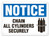 A photograph of a 01730 notice chain all cylinders securely OSHA sign with chained cylinders icon.