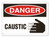 A photograph of a 01554 danger, caustic OSHA sign with corrosive icon.