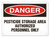 A photograph of a 01568 danger, pesticide storage area authorized personnel only OSHA sign.
