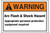 A photograph of an orange and white 07336 ANSI warning arc flash label, with basic text.