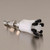 A photograph of a PTFE manifold with a stainless steel fitting.