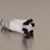 A photograph of a PTFE manifold with a polypropylene fitting.