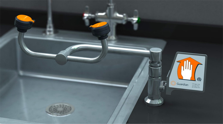 A photograph of a Guardian G1893 Eyewash, Deck Mounted, 90º Swivel mounted to the right of a sink (sink is not included).