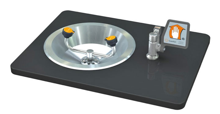 A photograph of a Guardian G1808 Eyewash, Recess Deck Mounted, Ball Valve with Flag Handle mounted in a countertop (countertop not included).