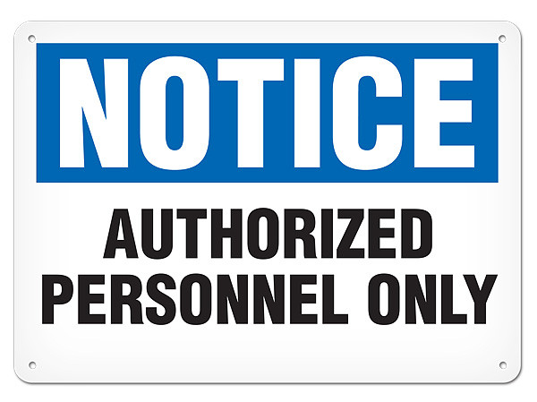A photograph of a 01647 notice authorized personnel only OSHA sign.