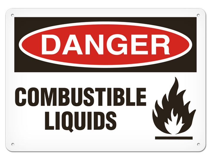 A photograph of a 01557 danger, combustible liquids OSHA sign with flame icon.