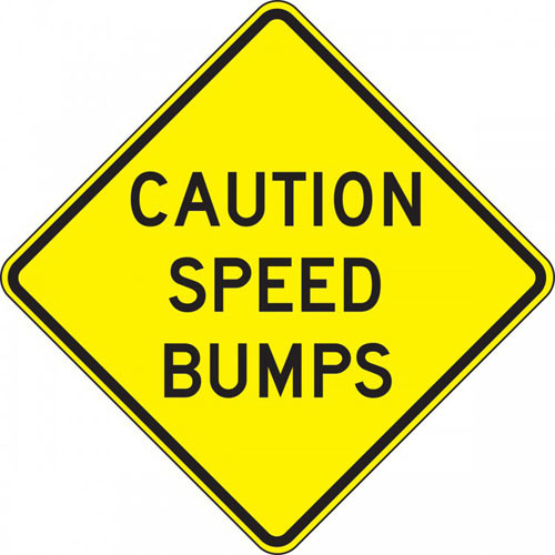A photograph of a yellow and black 06257 speed bump sign, reading caution speed bumps.
