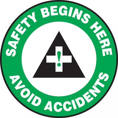 This green, white, and black sign features the text "Safety Begins Here Avoid Accidents". In the center is an ANSI-style safety cross in green and black. Use to promote awareness of safety and accidents.
