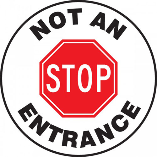 This white and black sign reads "Not An Entrance" around the edge. The center features a large red stop sign that says "STOP". Use this to mark roadways as one-way exits only.