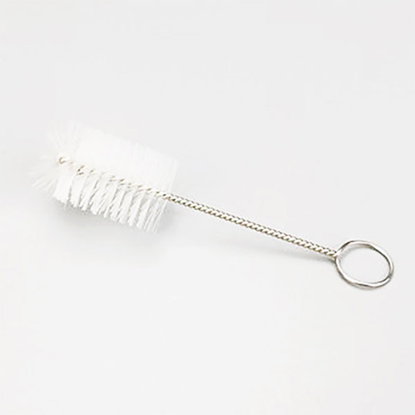 Photograph of a cleaning brush.