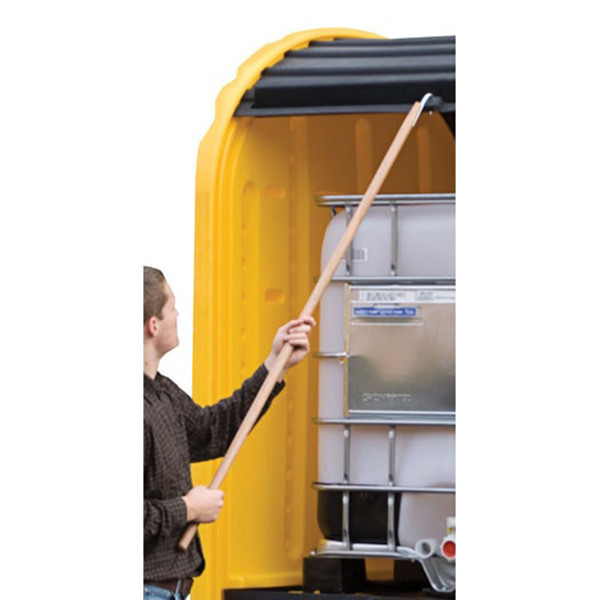 A photograph of a Reach Pole being used on doors of IBC Outdoor Shed (not included).