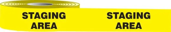 Photograph of roll of Tough-Mark™ Cold High Performance Marking Tapes in black and yellow, reading "Staging Area".