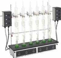 A photograph of a 20650 6 place combo heating mantle unit w/loaded flasks.